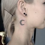 Crescent moon tattoo on the neck
