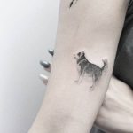 Cute small dog tattoo