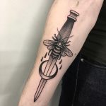 Dagger and bee tattoo