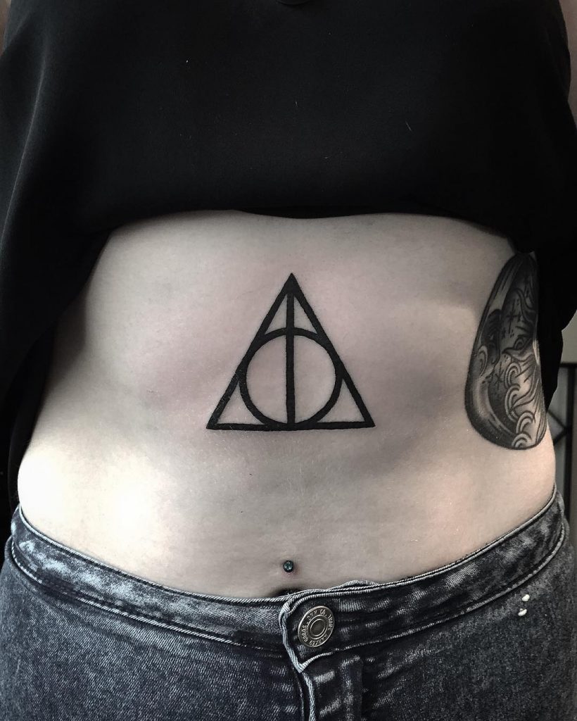 Deathly hallows belly tattoo 
