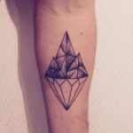 Diamond and mountain tattoo