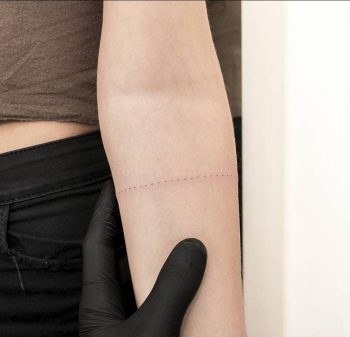 Dotted tiny armband tattoo