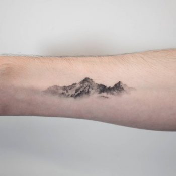 Dotwork mountains tattoo