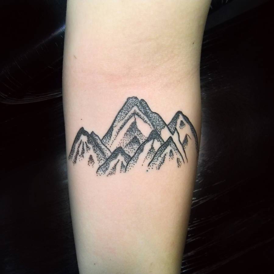Dotwork style mountain tattoo