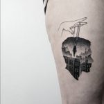 Double exposure head and city tattoo