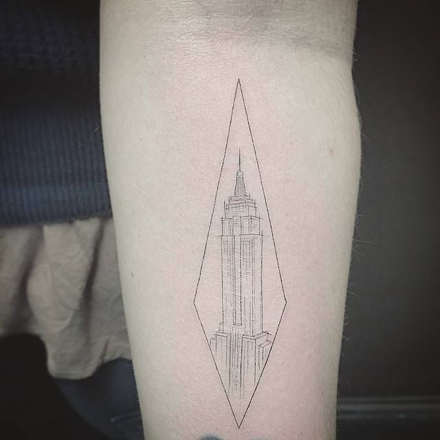 Empire state building in a rhombus tattoo