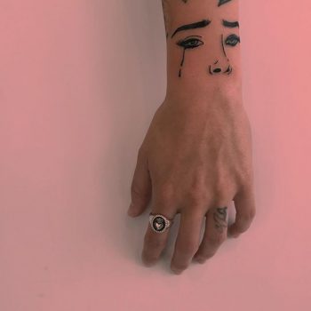 Eyes and nose tattoo