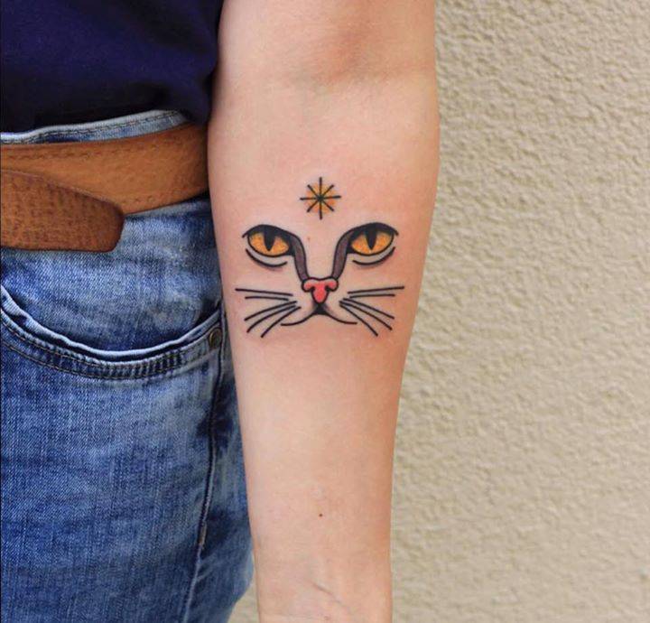 Face of a cat tattoo