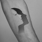Face with a shadow on the forearm