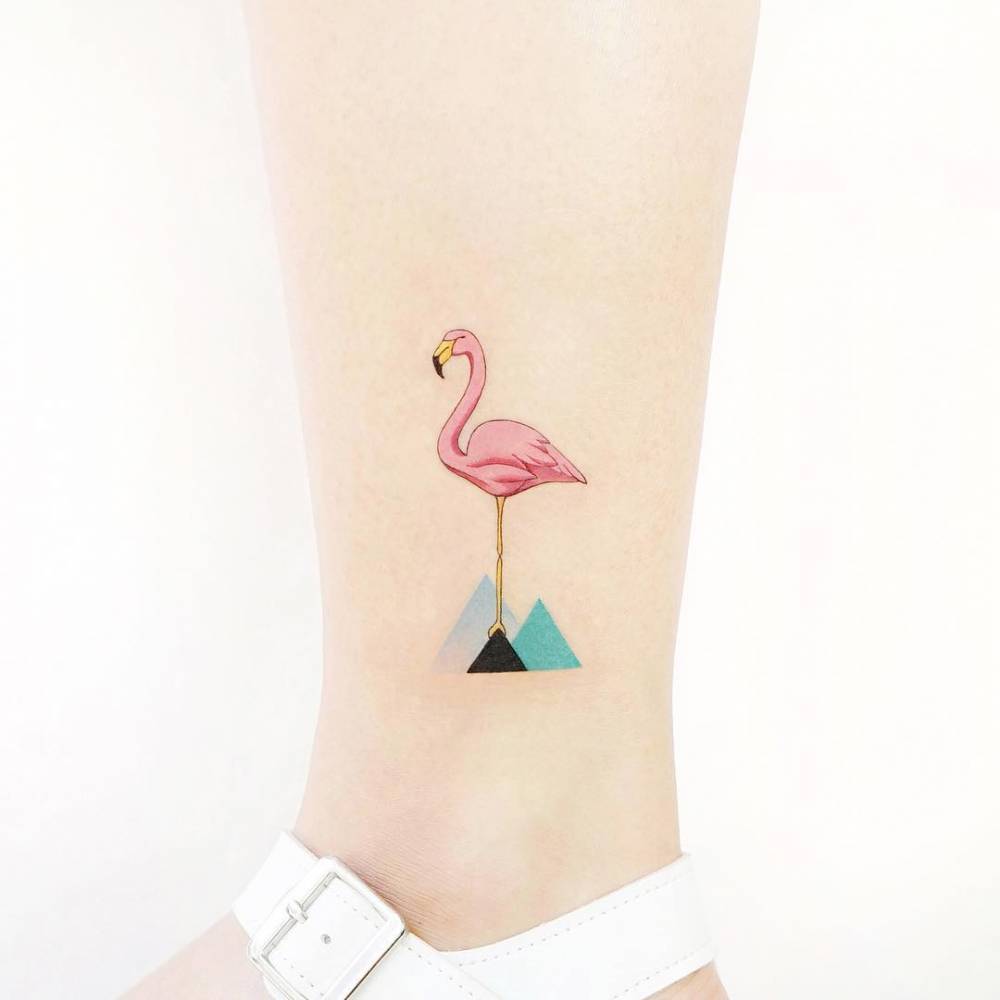 Flamingo and triangles tattoo