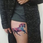 Geometric horse tattoo on the thigh