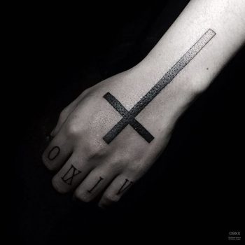 Gradient dotwork style cross tattoo