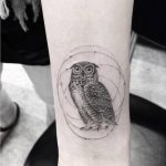 Hand poked owl tattoo