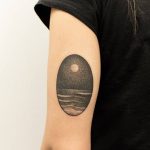 Handpoked sea landscape tattoo