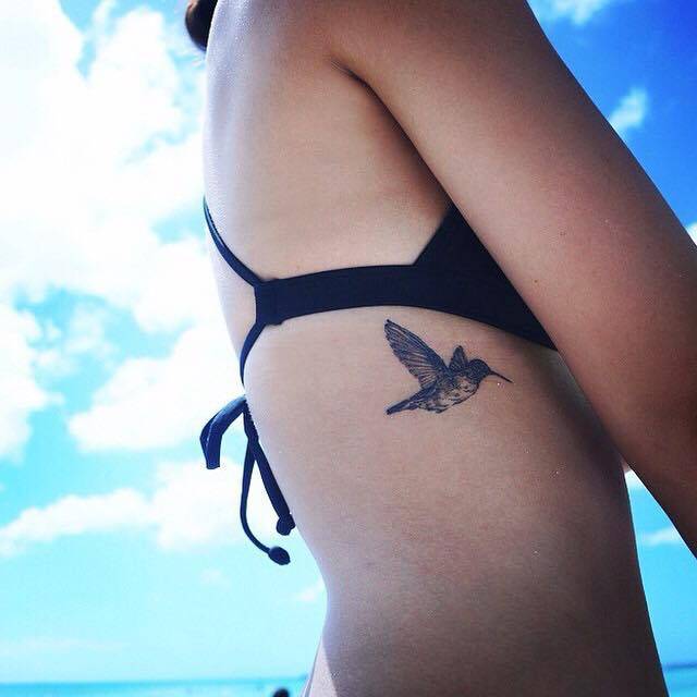 hummingbird tattoo on hip