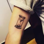Hyper realistic hourglass tattoo