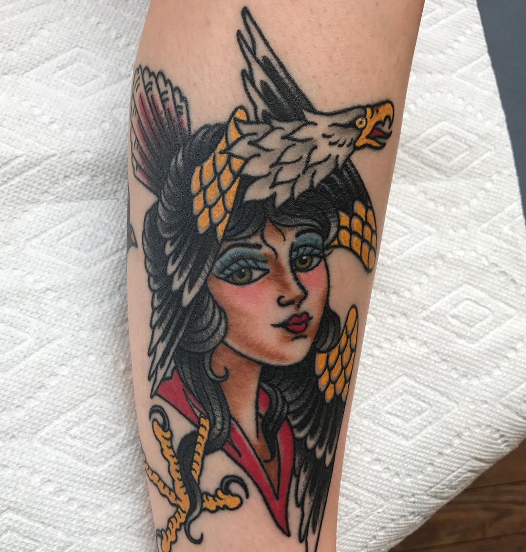 Lady hawk tattoo