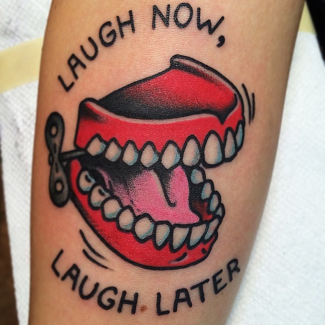 Laugh now laugh later tattoo