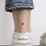 Letter e tattoo