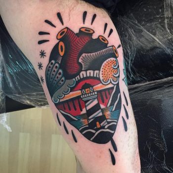 Lighthouse in a heart tattoo