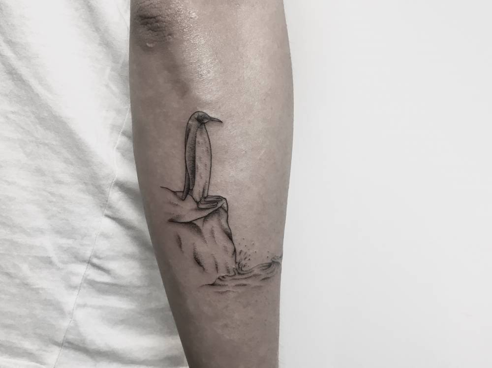 Lovely penguin tattoo