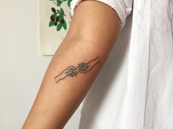 Lovers hands tattoo