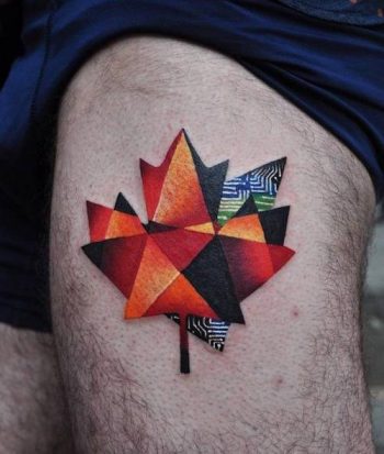 Maple leaf tattoo on the thigh
