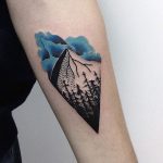 Mountain and trees tattoo