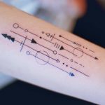 Multiple arrows tattoo