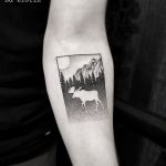 Negative space moose tattoo
