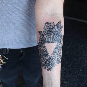 Negative space roses and triangle tattoo