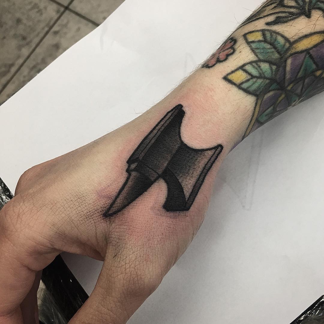 Old school anvil tattoo on the hand