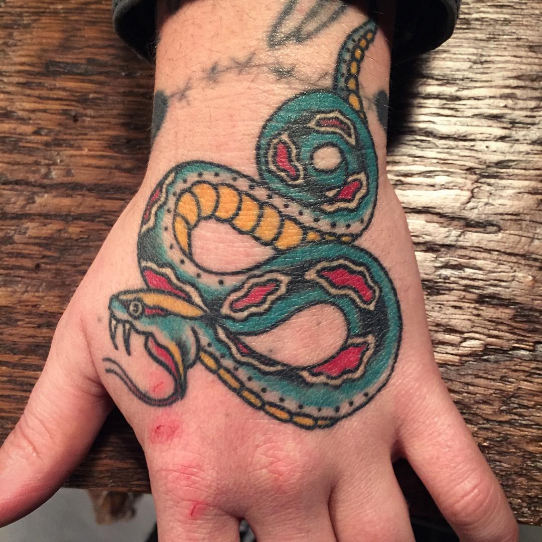 Old school green snake tattoo