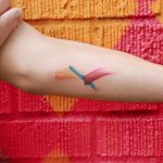 Orange blue and red abstract tattoo