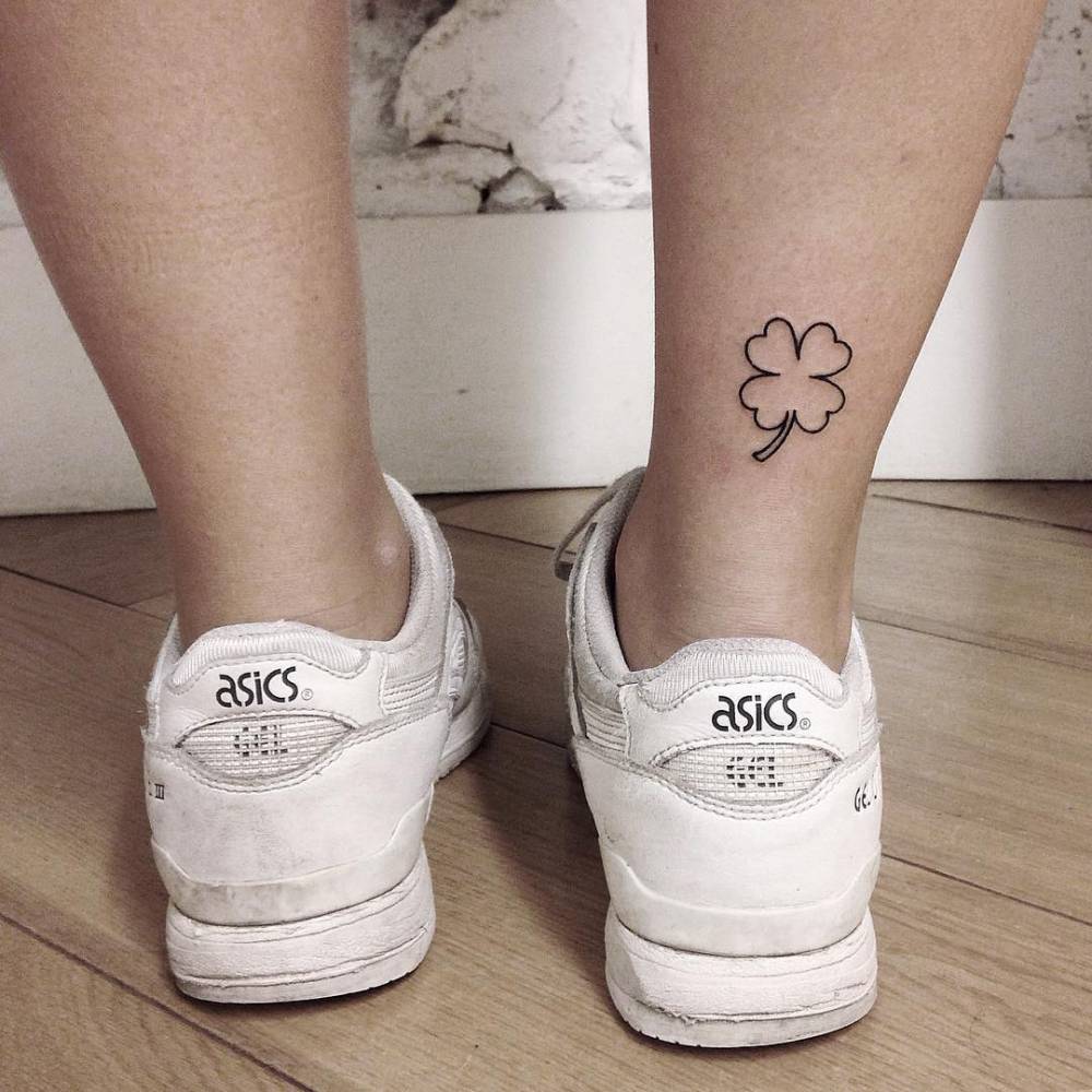 Outline clover tattoo on the ankle