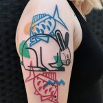 Rabbit and fish tattoo