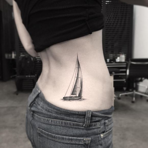 Sailing boat tattoo on the back