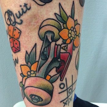 Skateboard wheel tattoo