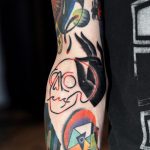 Skull and hand tattoo