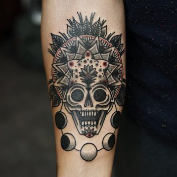 Skull mandala and moon phases tattoo