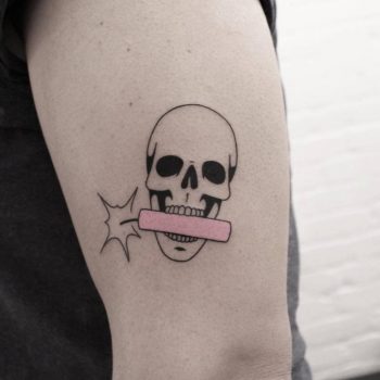 Skull with a dynamite tattoo
