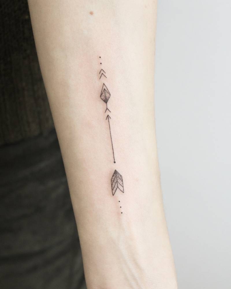 Small arrow tattoo - Tattoogrid.net