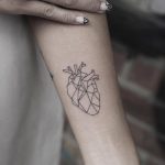 Small geometric heart tattoo