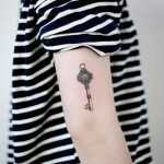Small key tattoo