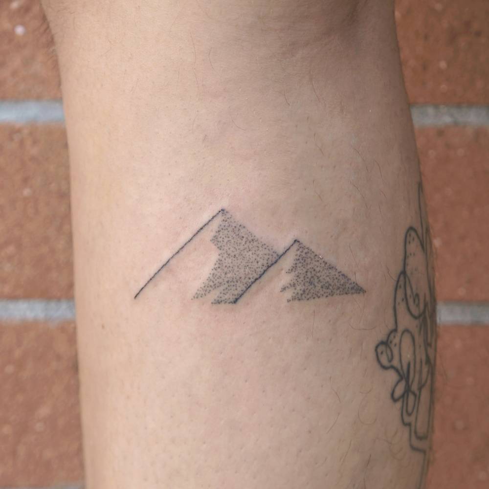 Small pyramids tattoo