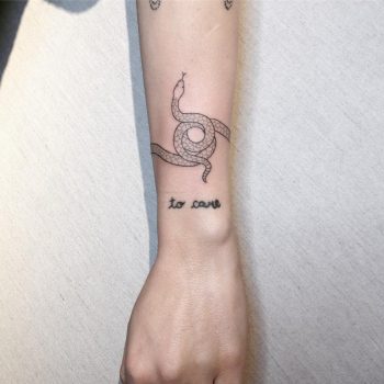 Snake wristband tattoo