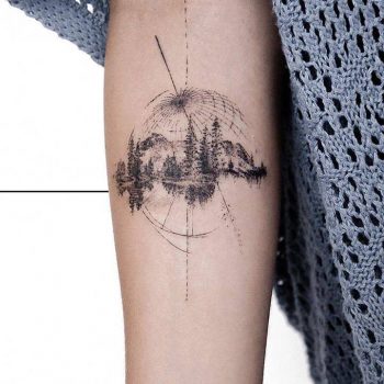 Sphere and forest tattoo