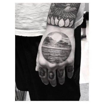 Sunset over the sea tattoo