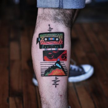 Tape face and mountain tattoo