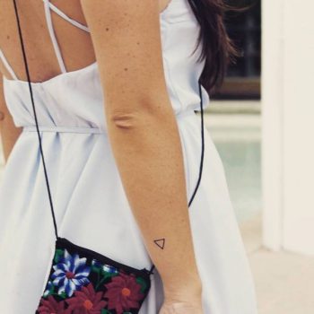 Tiny triangle tattoo on the wrist